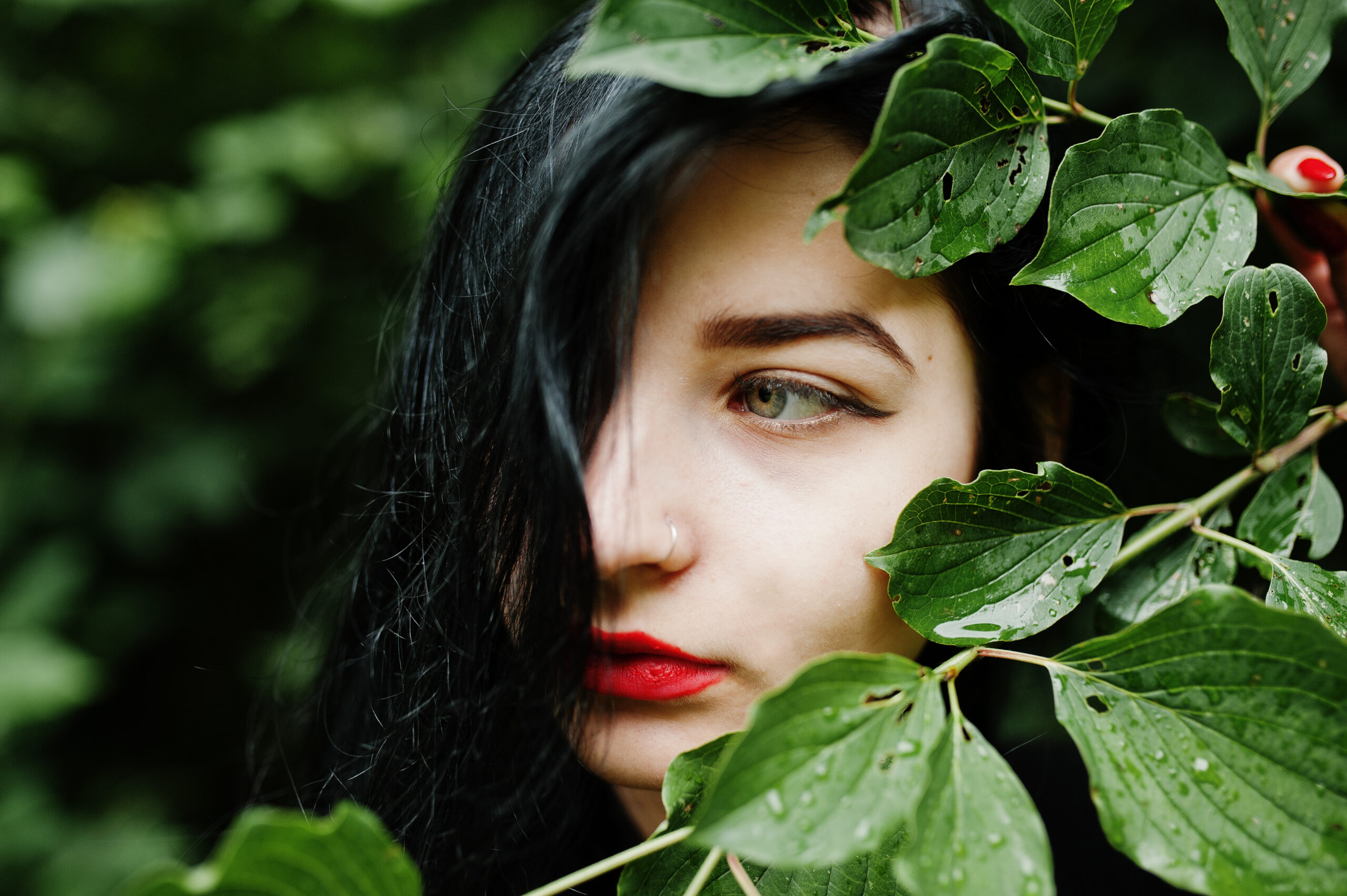 black hair and green eyes